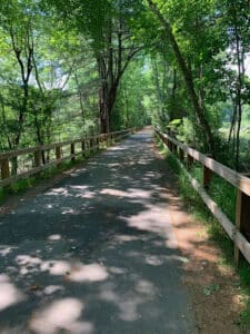 Paved walking and biking trail on the Bruce Freeman Rail Trail near Westford and Chelmsford, MA